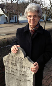 Naomi Marrow at Smith's tombstone.